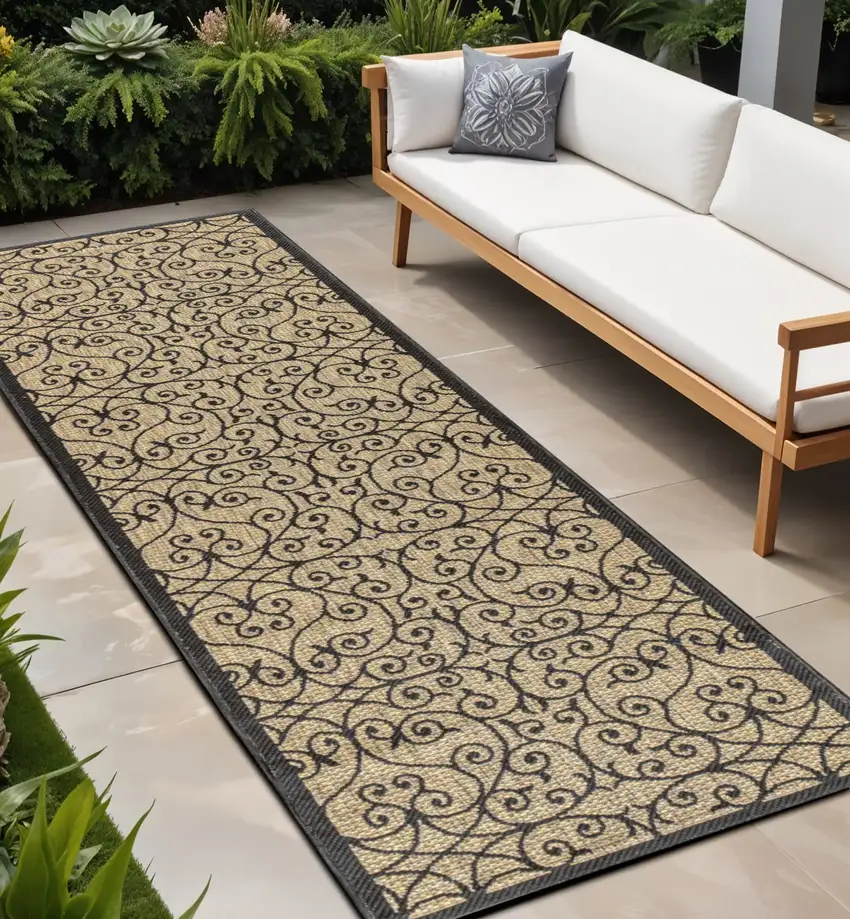 8' Black And Khaki Geometric Indoor Outdoor Runner Rug Photo 1