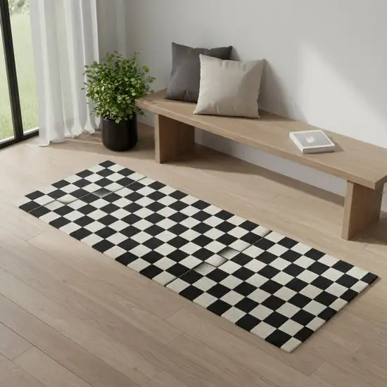 6' Black And Off White Checkered Washable Runner Rug With UV Protection Photo 1
