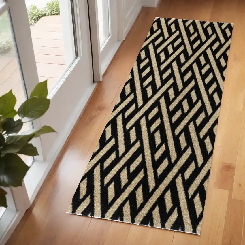 6' Black And Off White Checkered Washable Runner Rug With UV Protection Photo 1