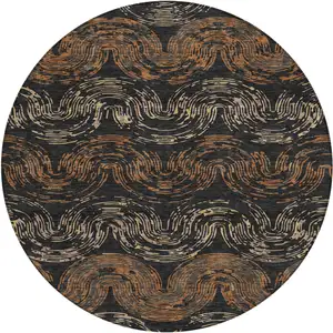 Photo of 8' Black And Rust Round Abstract Washable Indoor Outdoor Area Rug