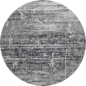 Photo of 8' Black And Silver Abstract Washable Round Rug With UV Protection