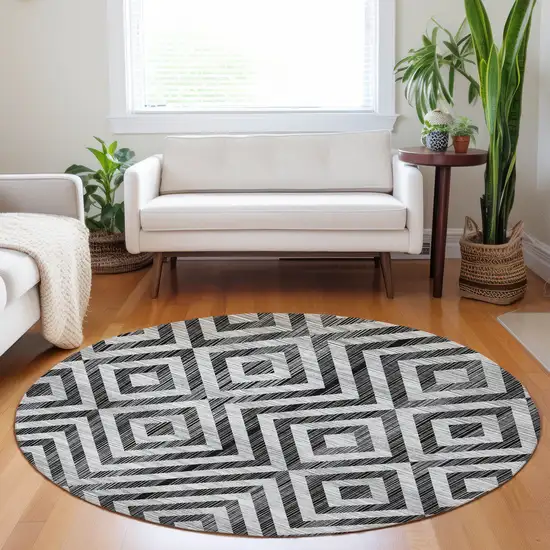 8' Black And Silver Geometric Washable Round Rug With UV Protection Photo 5