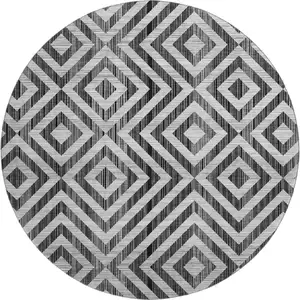 Photo of 8' Black And Silver Geometric Washable Round Rug With UV Protection