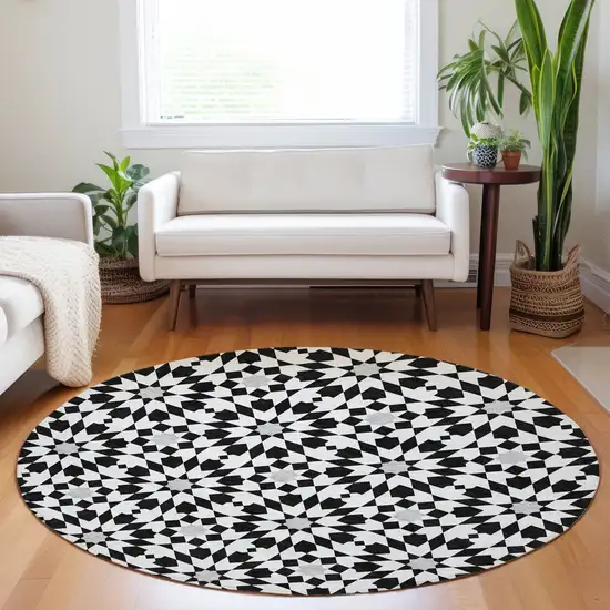 8' Black And Silver Geometric Washable Round Rug With UV Protection Photo 5