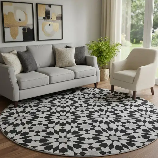 8' Black And Silver Geometric Washable Round Rug With UV Protection Photo 1