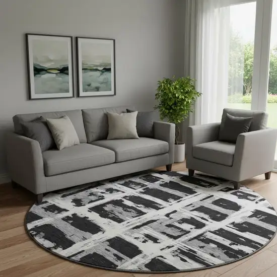 8' Black And Silver Striped Washable Round Rug With UV Protection Photo 1