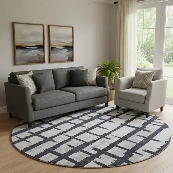 8' Black And Silver Striped Washable Round Rug With UV Protection Photo 1