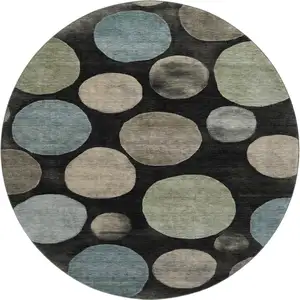 Photo of 8' Black And Taupe Geometric Washable Round Rug With UV Protection