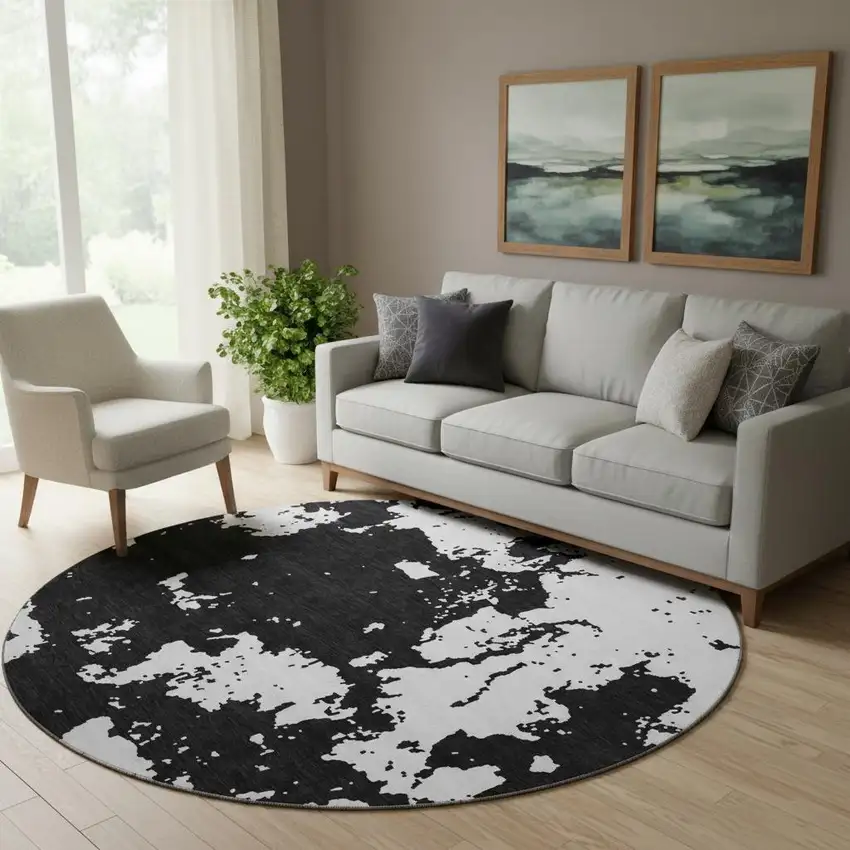 8' Black And White Abstract Washable Round Rug With UV Protection Photo 1