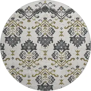Photo of 8' Black Beige And Gold Medallion Washable Round Rug With UV Protection