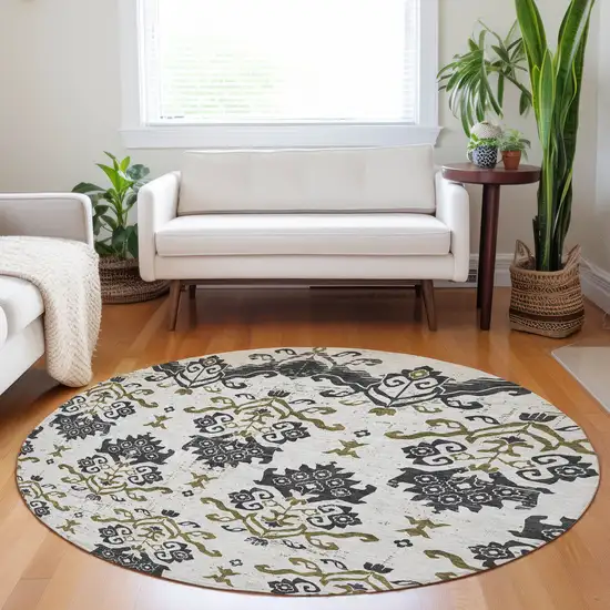 8' Black Beige And Gold Medallion Washable Round Rug With UV Protection Photo 5