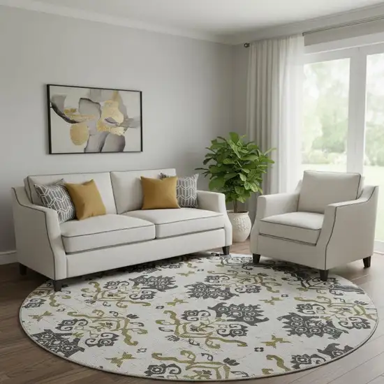 8' Black Beige And Gold Medallion Washable Round Rug With UV Protection Photo 1