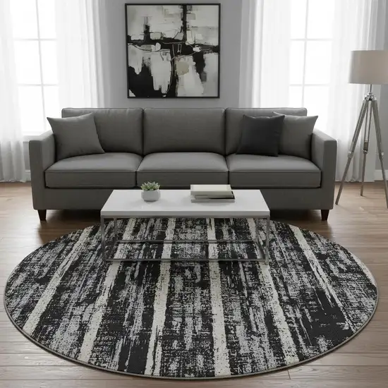 8' Black Beige And Gray Striped Washable Round Rug With UV Protection Photo 2