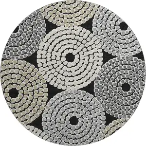 Photo of 8' Black Beige And Ivory Geometric Washable Round Rug With UV Protection