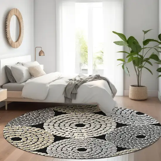 8' Black Beige And Ivory Geometric Washable Round Rug With UV Protection Photo 5