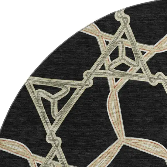 8' Black Beige And Ivory Geometric Washable Round Rug With UV Protection Photo 2