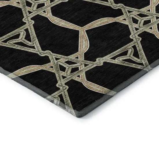 8' Black Beige And Ivory Geometric Washable Round Rug With UV Protection Photo 6