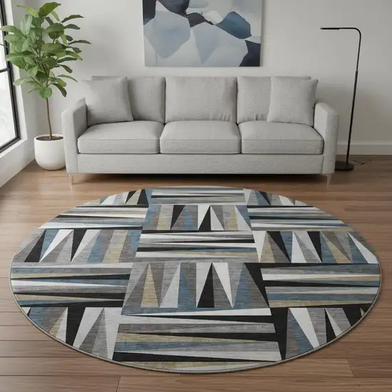 8' Black Beige And Ivory Geometric Washable Round Rug With UV Protection Photo 2
