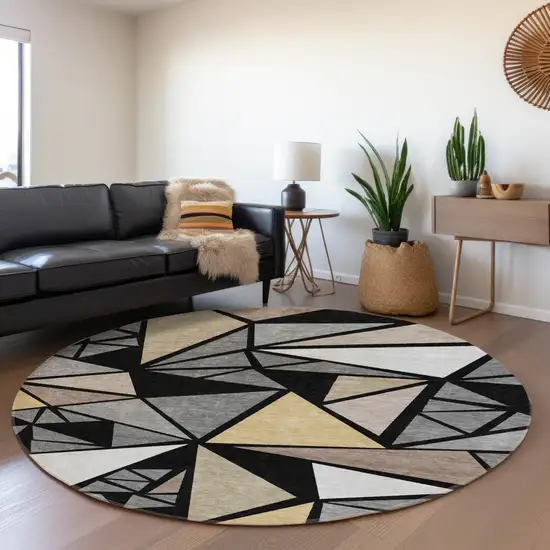8' Black Beige And Ivory Geometric Washable Round Rug With UV Protection Photo 4
