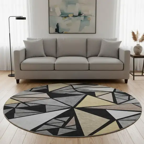 8' Black Beige And Ivory Geometric Washable Round Rug With UV Protection Photo 2