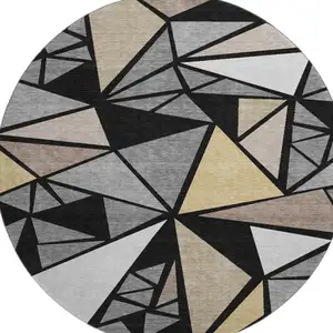 Photo of 8' Black Beige And Ivory Geometric Washable Round Rug With UV Protection