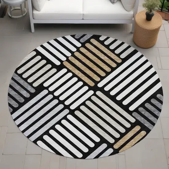 8' Black Beige And Ivory Round Geometric Washable Indoor Outdoor Area Rug Photo 9