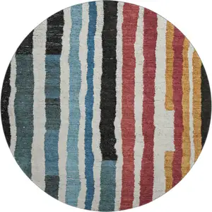 Photo of 8' Black Blue And Copper Striped Washable Round Rug With UV Protection