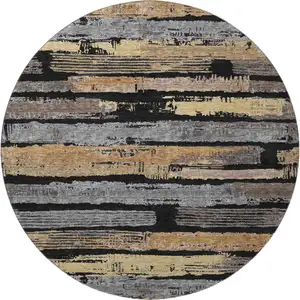 Photo of 8' Black Copper And Gold Striped Washable Round Rug With UV Protection