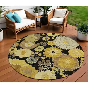 Photo of 8' Black Gold And Beige Round Floral Washable Indoor Outdoor Area Rug