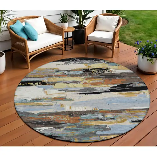 8' Black Gold And Blue Round Abstract Washable Indoor Outdoor Area Rug Photo 1