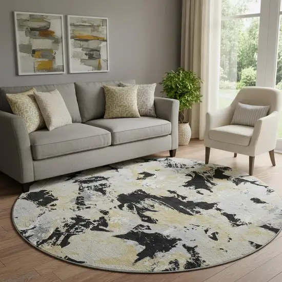 8' Black Gold And Gray Floral Washable Round Rug With UV Protection Photo 1