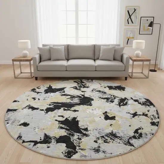 8' Black Gold And Gray Floral Washable Round Rug With UV Protection Photo 2