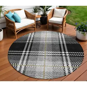 Photo of 8' Black Gold And Gray Round Plaid Washable Indoor Outdoor Area Rug