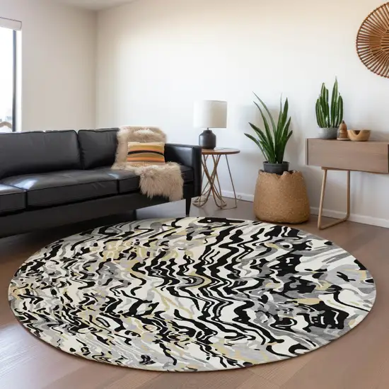 8' Black Gold And Ivory Abstract Washable Round Rug With UV Protection Photo 4