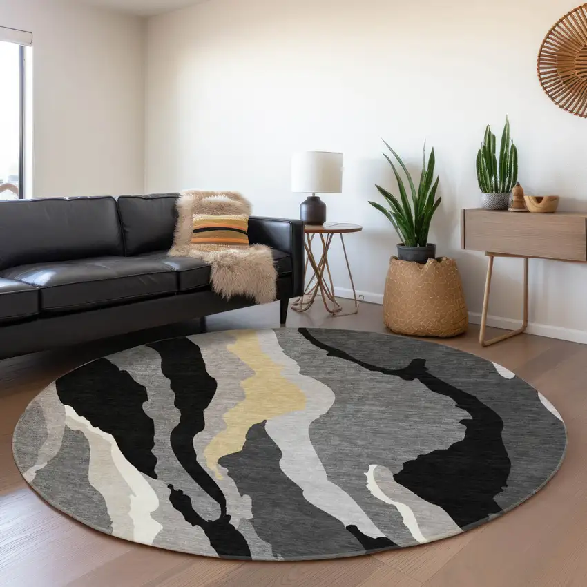 8' Black Gold And Ivory Abstract Washable Round Rug With UV Protection Photo 5