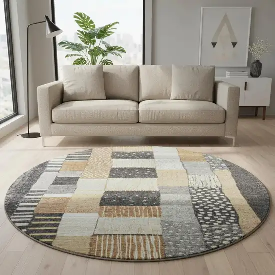 8' Black Gold And Ivory Geometric Washable Round Rug With UV Protection Photo 2