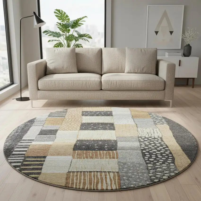 8' Black Gold And Ivory Geometric Washable Round Rug With UV Protection Photo 2