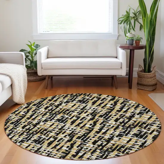 8' Black Gold And Ivory Round Abstract Washable Indoor Outdoor Area Rug Photo 8