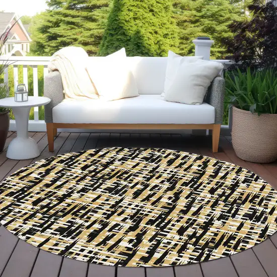 8' Black Gold And Ivory Round Abstract Washable Indoor Outdoor Area Rug Photo 7
