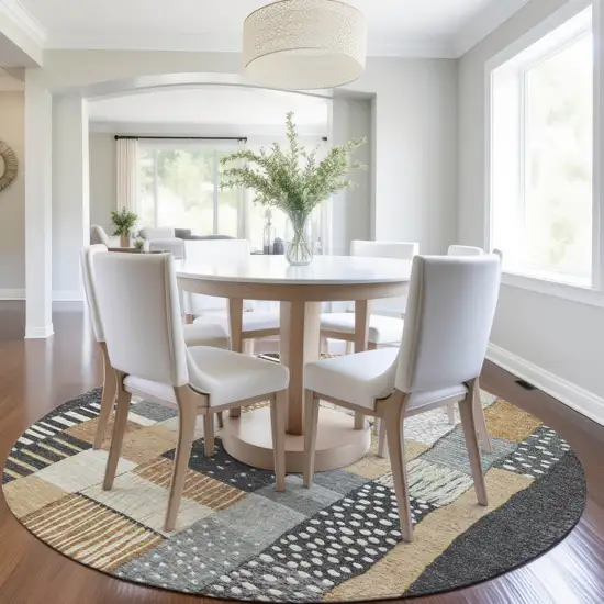 8' Black Gold And Ivory Round Geometric Washable Indoor Outdoor Area Rug Photo 7