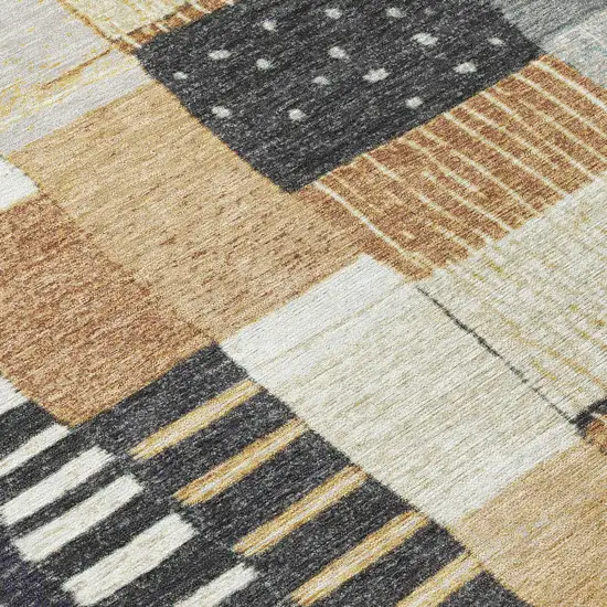 8' Black Gold And Ivory Round Geometric Washable Indoor Outdoor Area Rug Photo 9