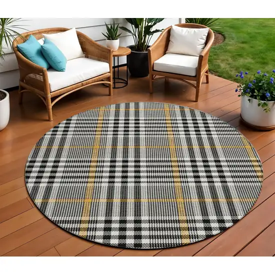 8' Black Gold And Ivory Round Plaid Washable Indoor Outdoor Area Rug Photo 1