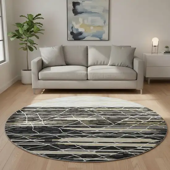 8' Black Gold And Ivory Striped Washable Round Rug With UV Protection Photo 2