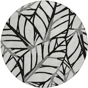 Photo of 8' Black Gray And Beige Round Floral Washable Indoor Outdoor Area Rug
