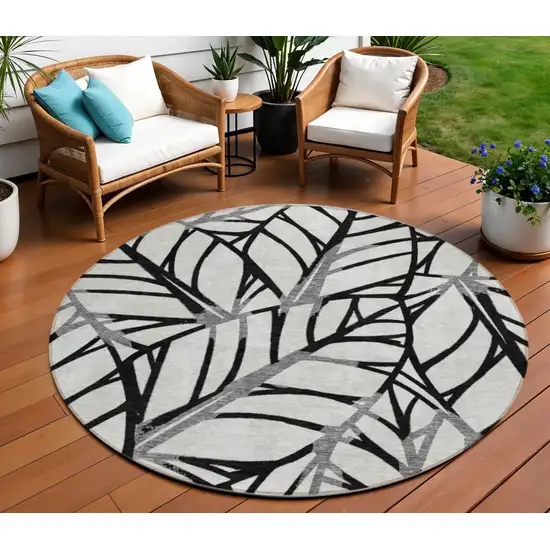 8' Black Gray And Beige Round Floral Washable Indoor Outdoor Area Rug Photo 1