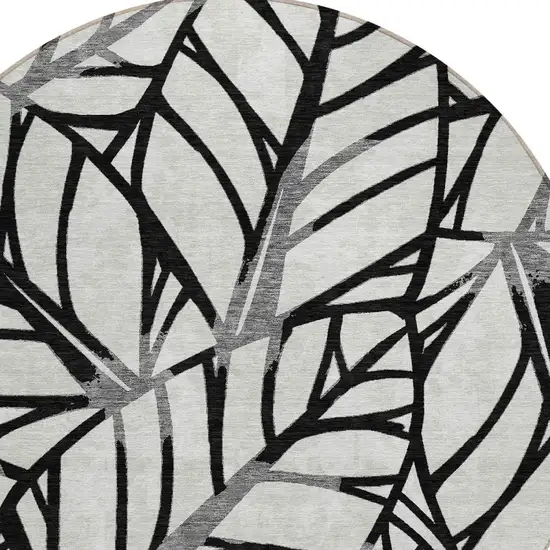 8' Black Gray And Beige Round Floral Washable Indoor Outdoor Area Rug Photo 4