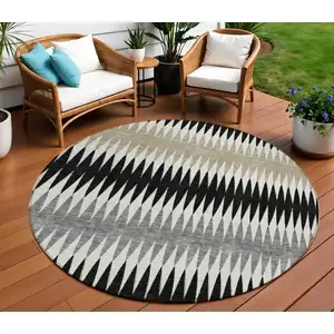 Photo of 8' Black Gray And Beige Round Striped Washable Indoor Outdoor Area Rug