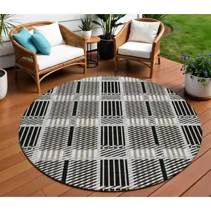 Photo of 8' Black Gray And Brown Round Plaid Washable Indoor Outdoor Area Rug