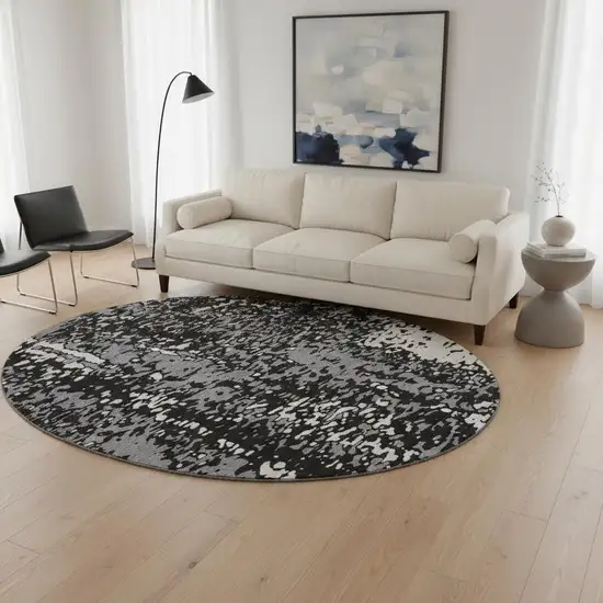 8' Black Gray And Ivory Abstract Washable Round Rug With UV Protection Photo 2