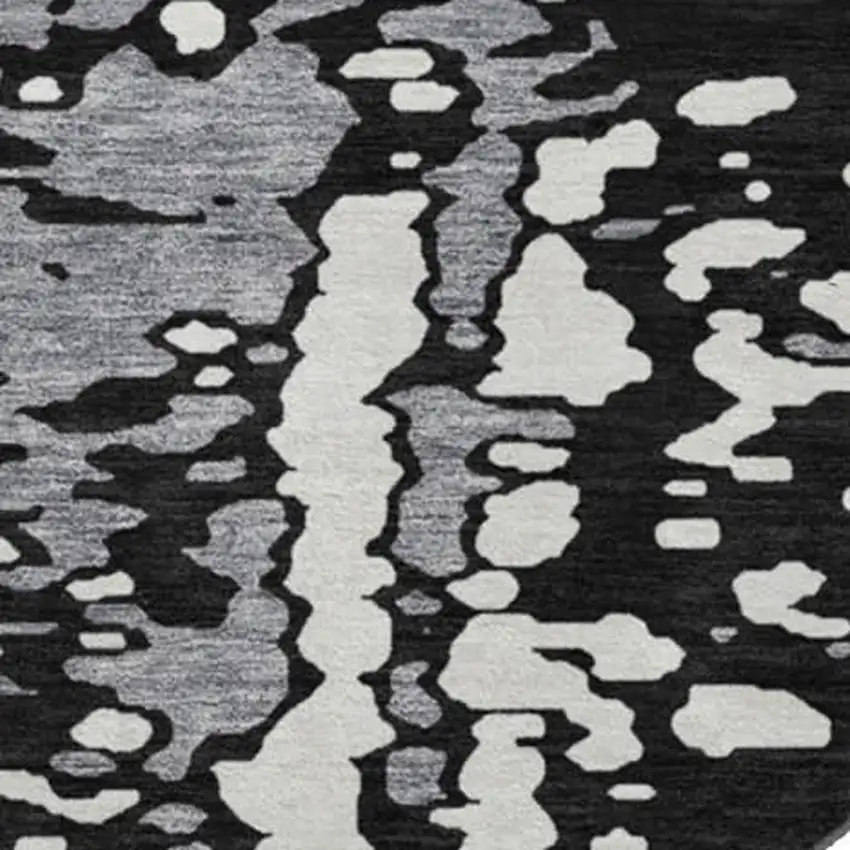 8' Black Gray And Ivory Abstract Washable Round Rug With UV Protection Photo 2